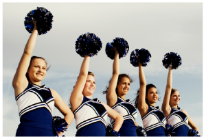 Picture of cheerleaders, cheering someone on