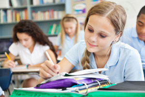 Image of school students, sitting in class